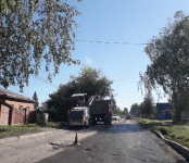Срезают асфальт на «убитой дороге» в Бердске